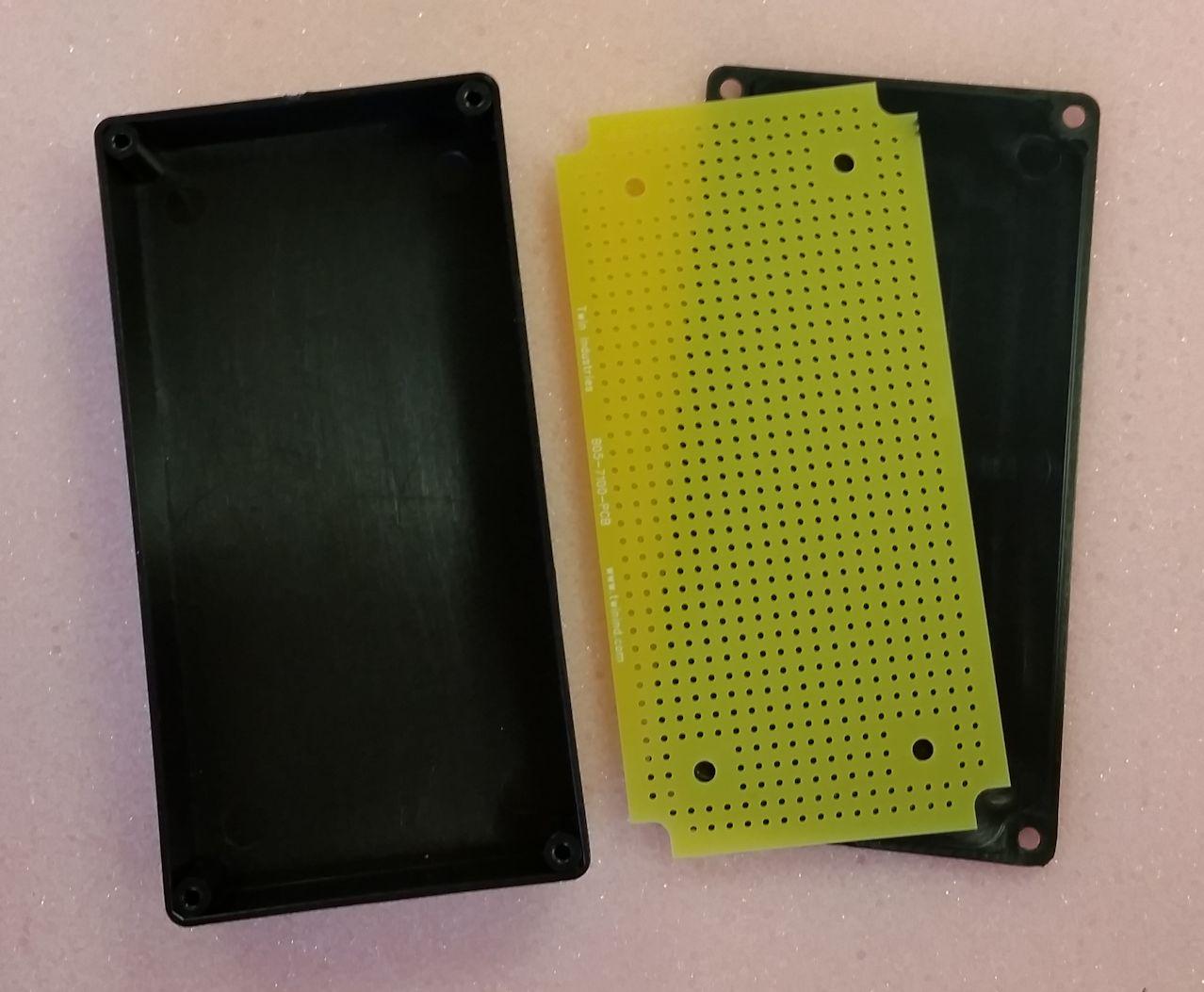 Twin Industries-B05-7100 Black ABS Plastic Project Box with matching non-plated protoboard; FR4 0.062". Box Dim = 4.4" x 2.2" x 0.9"