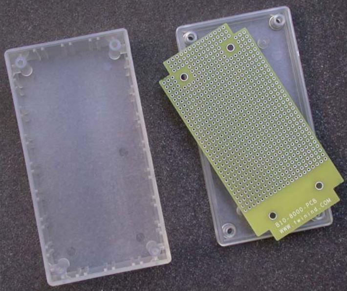 Twin Industries-C10-8000 Clear ABS Plastic Project Box with matching plated protoboard; FR4 0.062". Box Dim = 4.5" x 2.3" x 1.7"